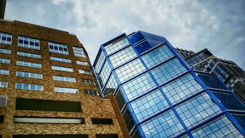 Low angle view of modern building against sky