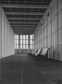 Rear view of man sitting on bench