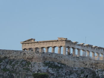 Low angle view of built structure against clear sky