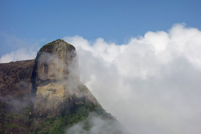 Scenic view of volcanic mountain against sky