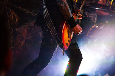Man playing at music concert