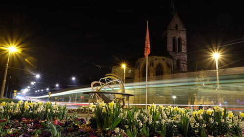 Illuminated building against sky at night