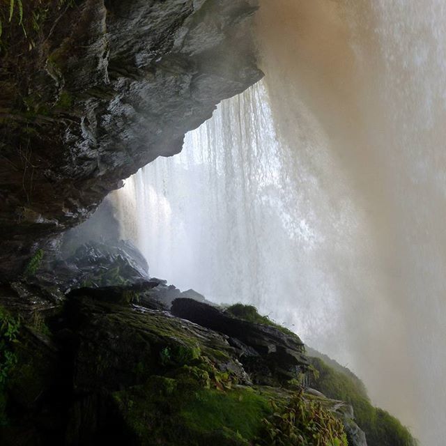 water, waterfall, scenics, beauty in nature, rock - object, rock formation, motion, nature, tranquil scene, flowing water, tranquility, cliff, long exposure, surf, flowing, rock, idyllic, mountain, geology, non-urban scene