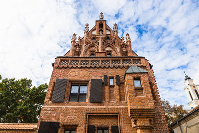 Low angle view of historic building against sky