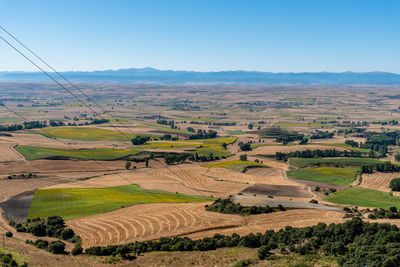 High angle view of farmland with fields for sunflower cultivation. summer time, la bureba, burgos