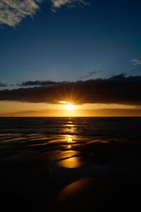 Scenic view of sea at sunset