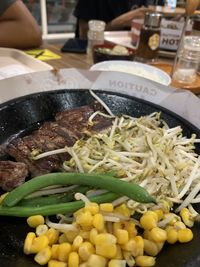 Close-up of chopped vegetables on table