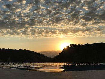 Scenic view of sea against sky during sunset