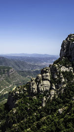 Scenic view of mountains against clear sky