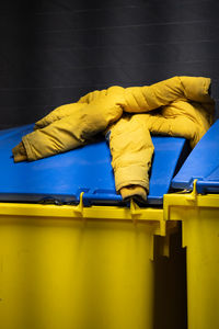 Person sleeping on yellow floor