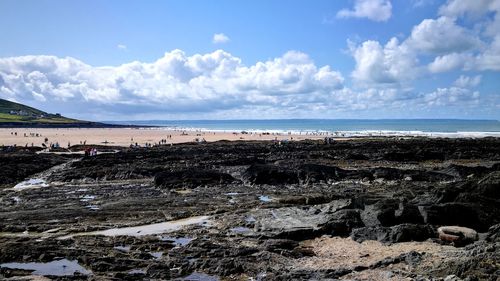 Scenic view of beach against sky