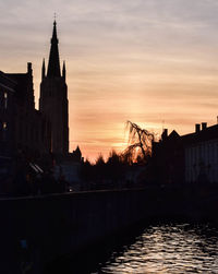 View of buildings at sunset