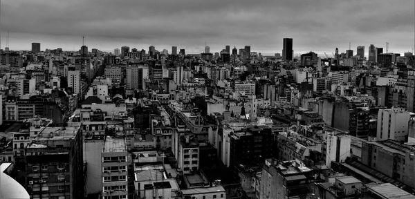 Aerial view of cityscape against sky