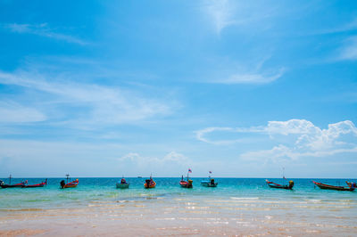 Scenic view of sea against blue sky