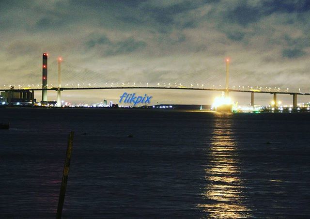 sky, connection, water, bridge - man made structure, sunset, cloud - sky, architecture, built structure, waterfront, suspension bridge, river, engineering, transportation, sea, cloudy, bridge, cloud, tranquility, reflection, nature