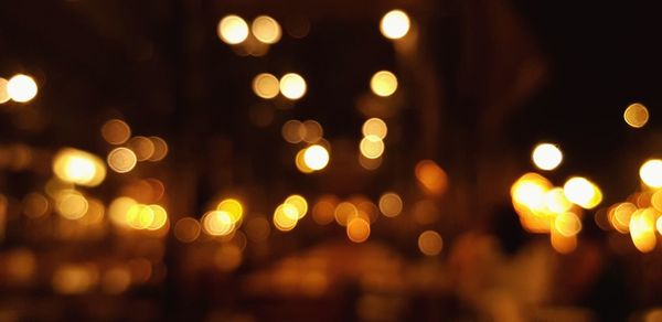 Defocused image of illuminated lights at night