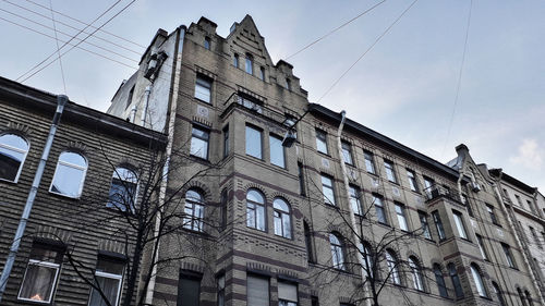 Low angle view of old building against sky