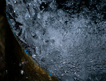 Full frame shot of water flowing through rocks
