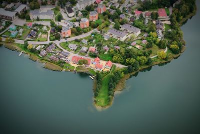 High angle view of houses by sea