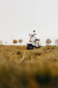 Restored old vespa in mint green and vintage style decor