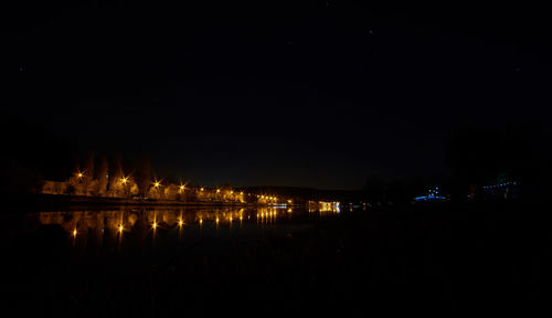 View of illuminated buildings at night