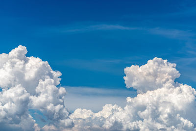 Low angle view of clouds in blue sky