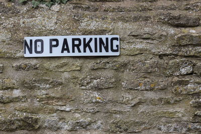 Close-up of text on wall