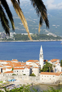 High angle view of town by sea