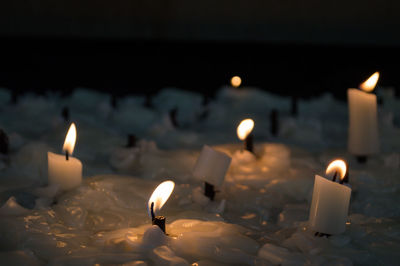 Close-up of burning candle