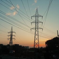 Electricity pylon at sunset