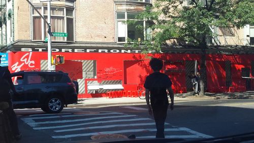 Man standing on city street