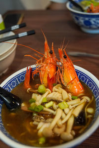 Close-up of seafood noodles in a bowl on table