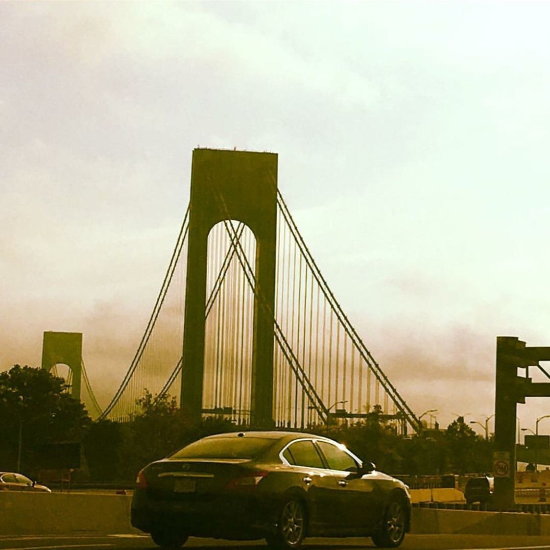 city, transportation, car, architecture, travel destinations, cityscape, sky, suspension bridge, outdoors, no people, sunset, bridge - man made structure, cloud - sky, day, skyscraper