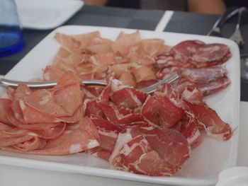 High angle view of meat in plate on table