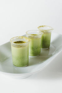 Close-up of drink against white background