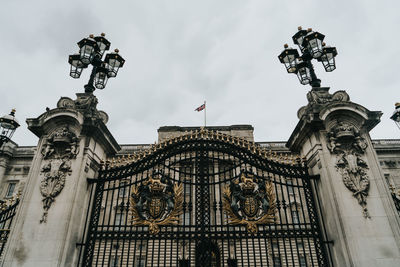 Low angle view of ornate building against sky