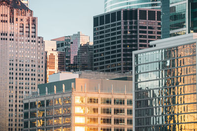 Office buildings in the city at sunset.