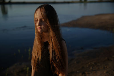 Portrait of teenage girl in water