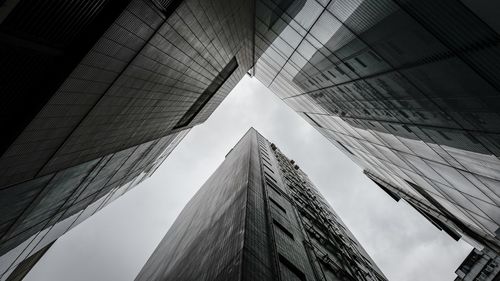 Low angle view of skyscrapers against sky