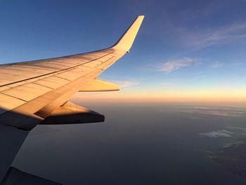 Cropped image of airplane wing