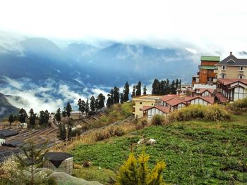 Panoramic view of landscape against cloudy sky