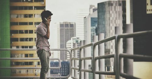 Woman standing in front of building