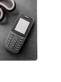 High angle view of mobile phone on table