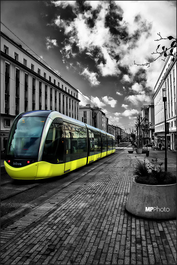 transportation, mode of transport, architecture, building exterior, land vehicle, built structure, car, sky, street, city, road, cloud - sky, diminishing perspective, travel, the way forward, stationary, public transportation, cloud, day, outdoors