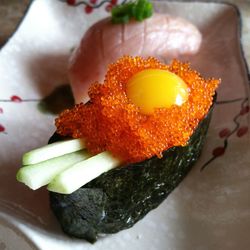 Close-up of sushi served in plate on table