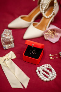 High angle view of wedding accessories on table