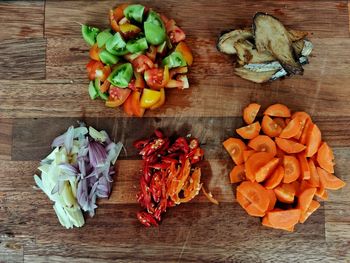 High angle view of chopped vegetables on cutting board