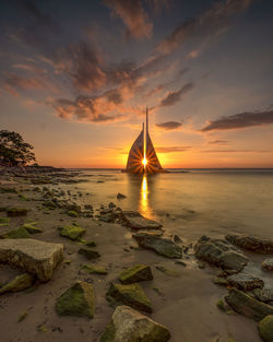 Scenic view of sea against sky during sunset