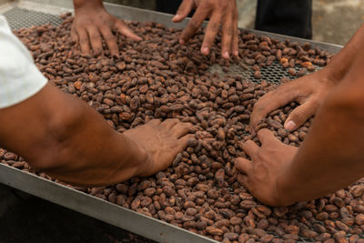 Midsection of man preparing food