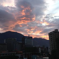 Cityscape against sky during sunset